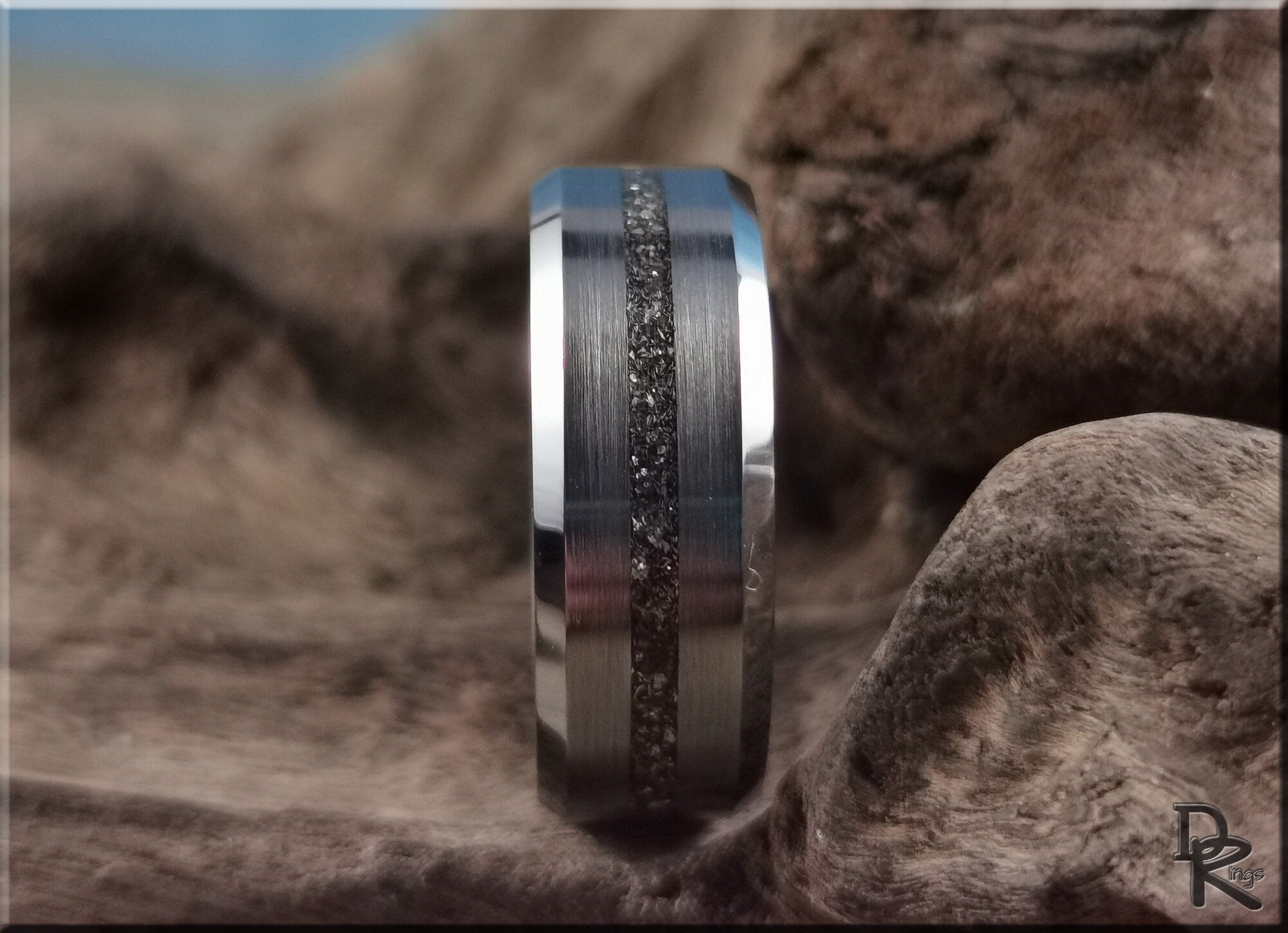 DR Rings tungsten ring with meteorite inlay featuring a brushed silver finish and rugged texture