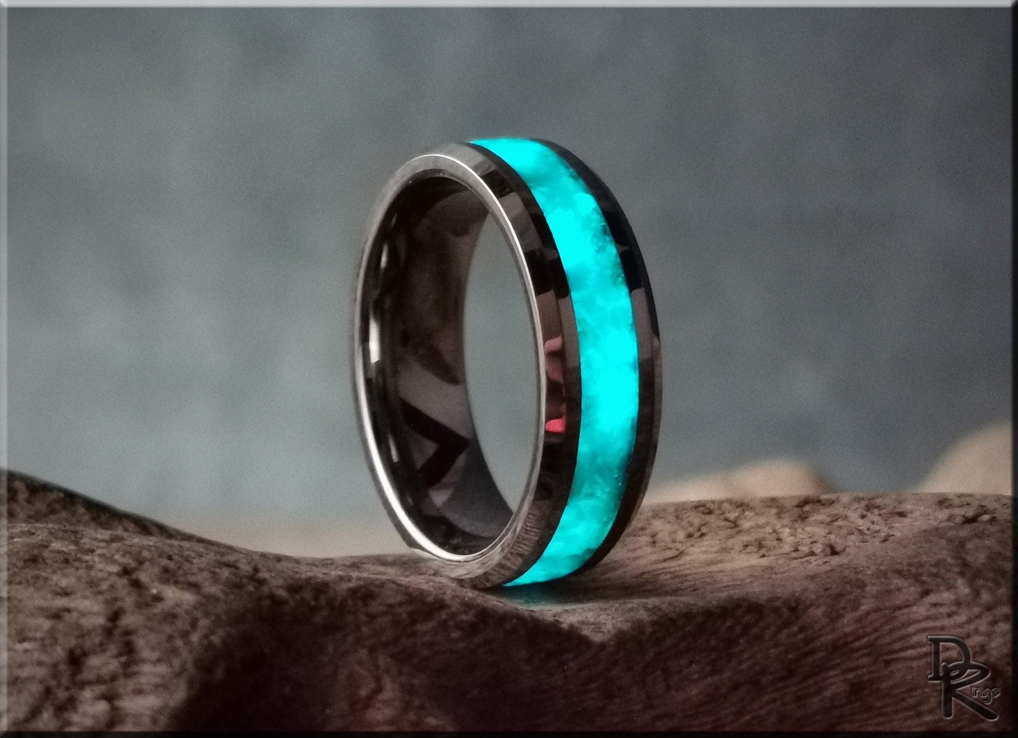 Tungsten ring with opal and glow blue light band on textured surface by DR Rings