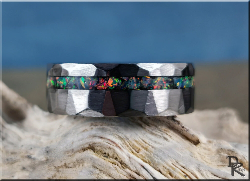 DR Rings tungsten ring with opal inlay featuring a faceted black band and vibrant multicolor opal center