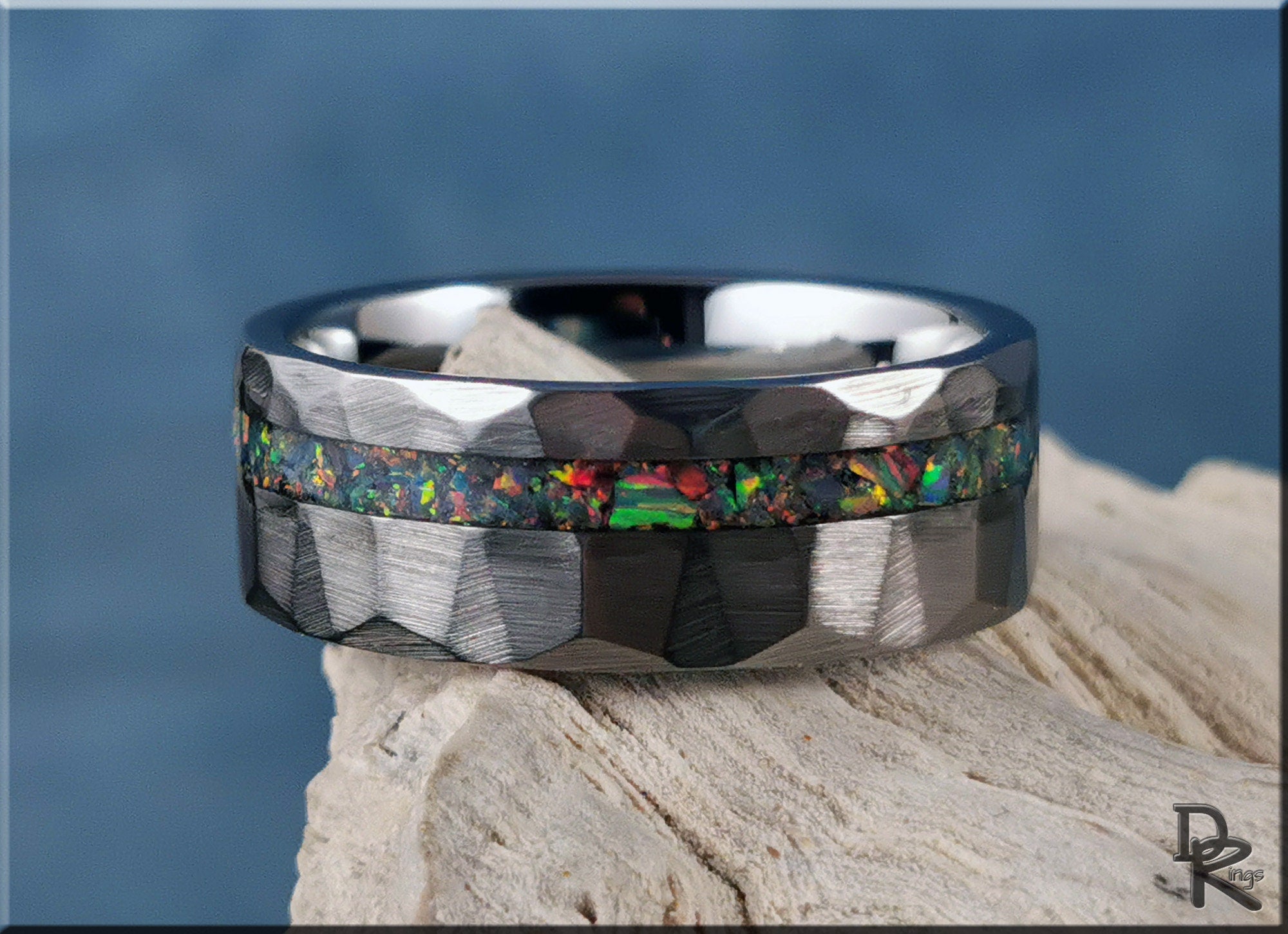 DR Rings tungsten ring with opal inlay featuring a hammered black finish and vibrant multicolor stones