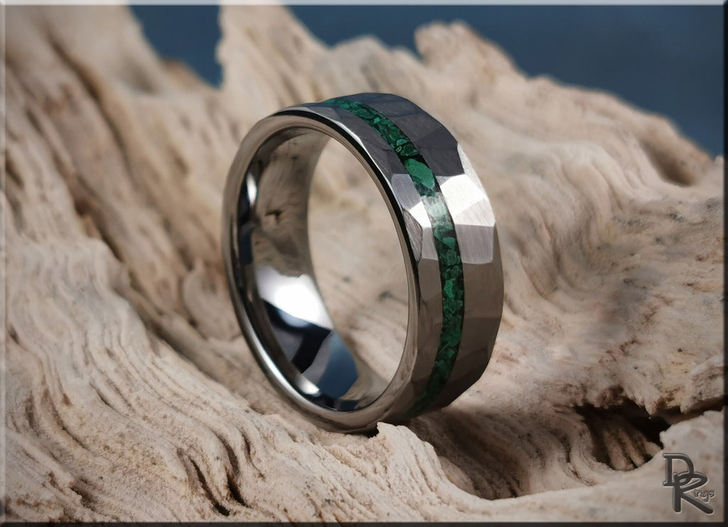 Hammered tungsten ring with malachite inlay by DR Rings on textured wood background