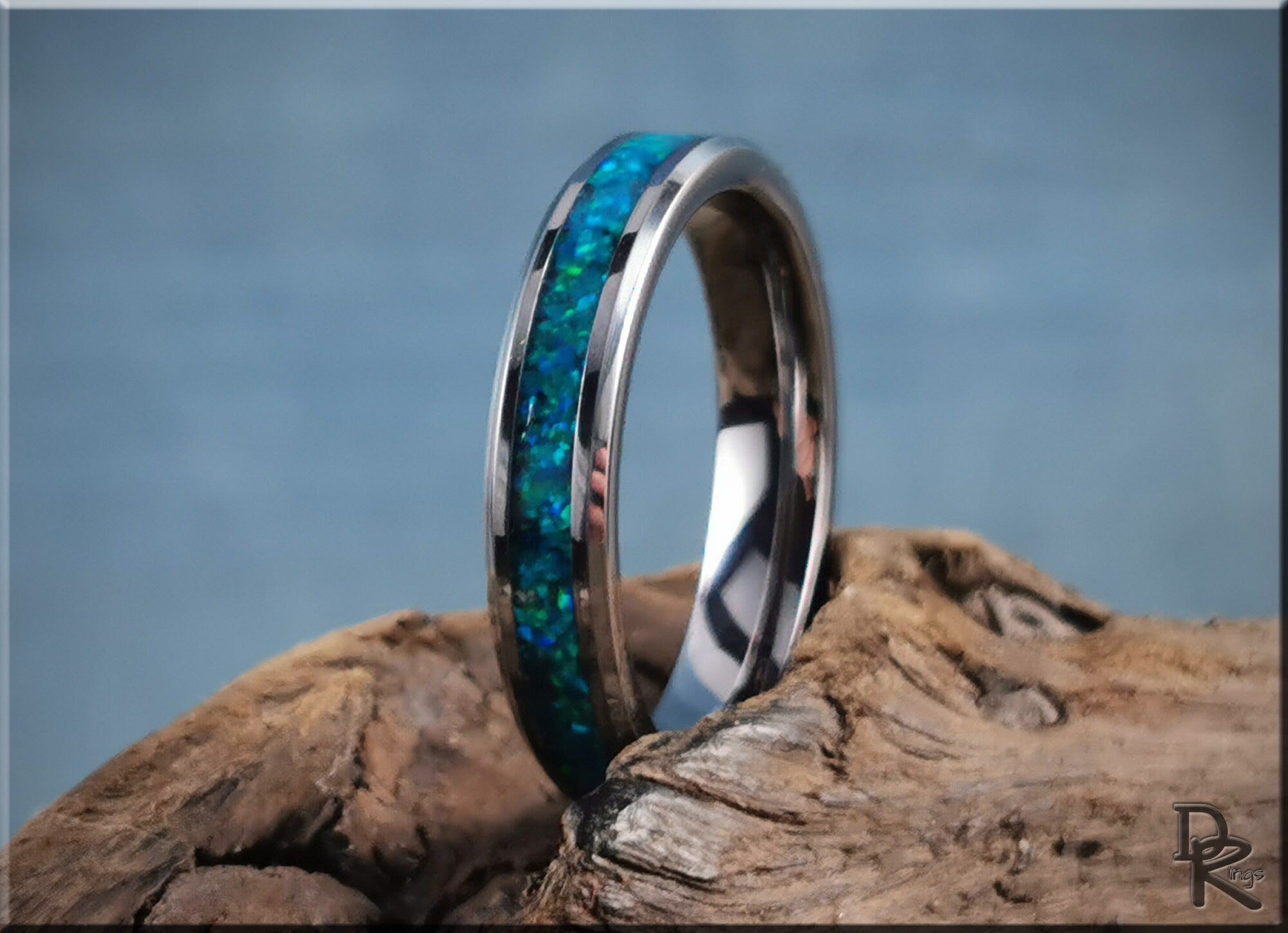 Tungsten carbide ring with opal inlay featuring vibrant blue and green colors by DR Rings