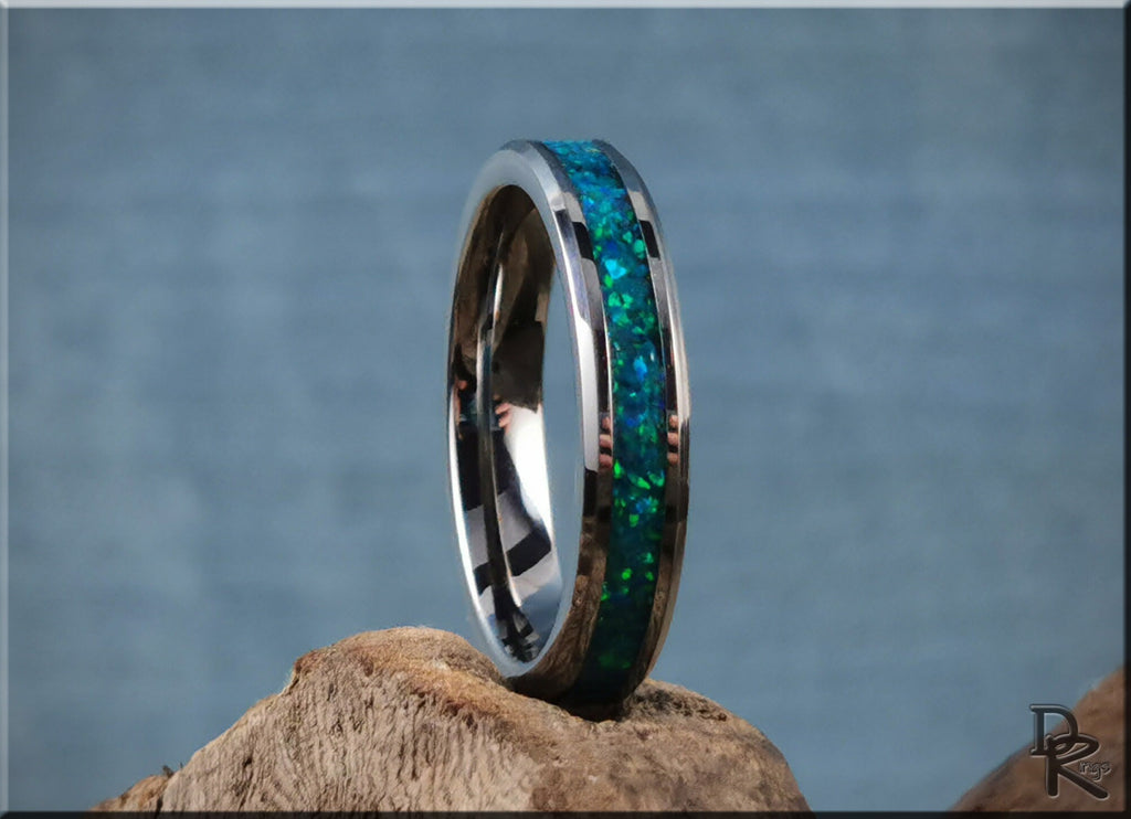 Tungsten carbide ring with opal inlay featuring blue and green shimmering stones by DR Rings