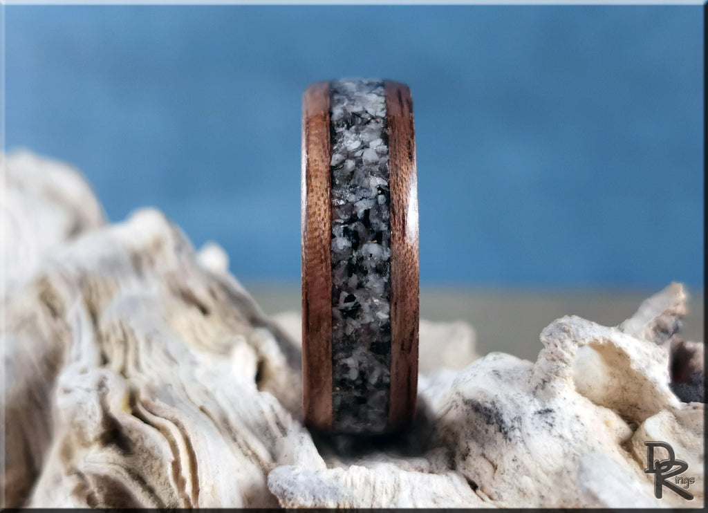 Walnut wood ring with with inlay on antler core featuring dark wood and unique stone pattern inlay