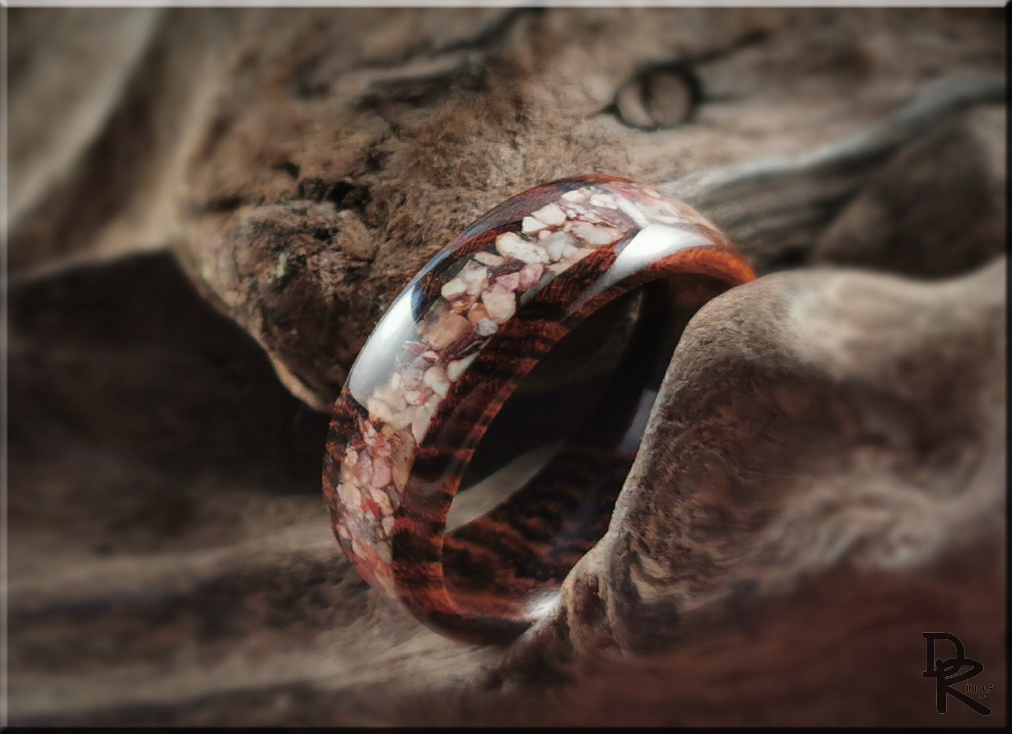 DR Rings wood ring with inlay featuring a natural stone pattern embedded in polished wooden band
