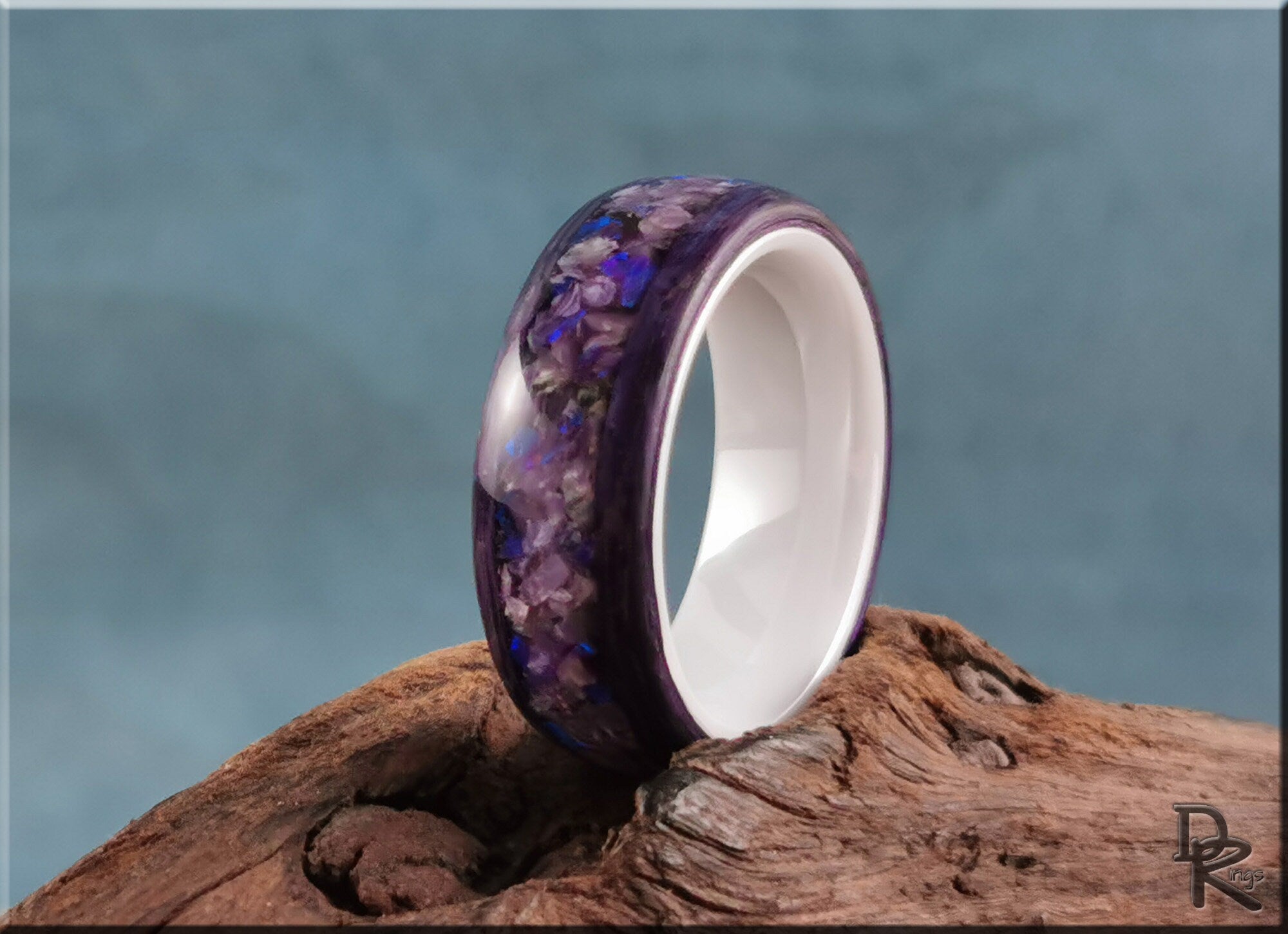 DR Rings wood ring with opal inlay featuring purple and blue opal pieces set in wood band